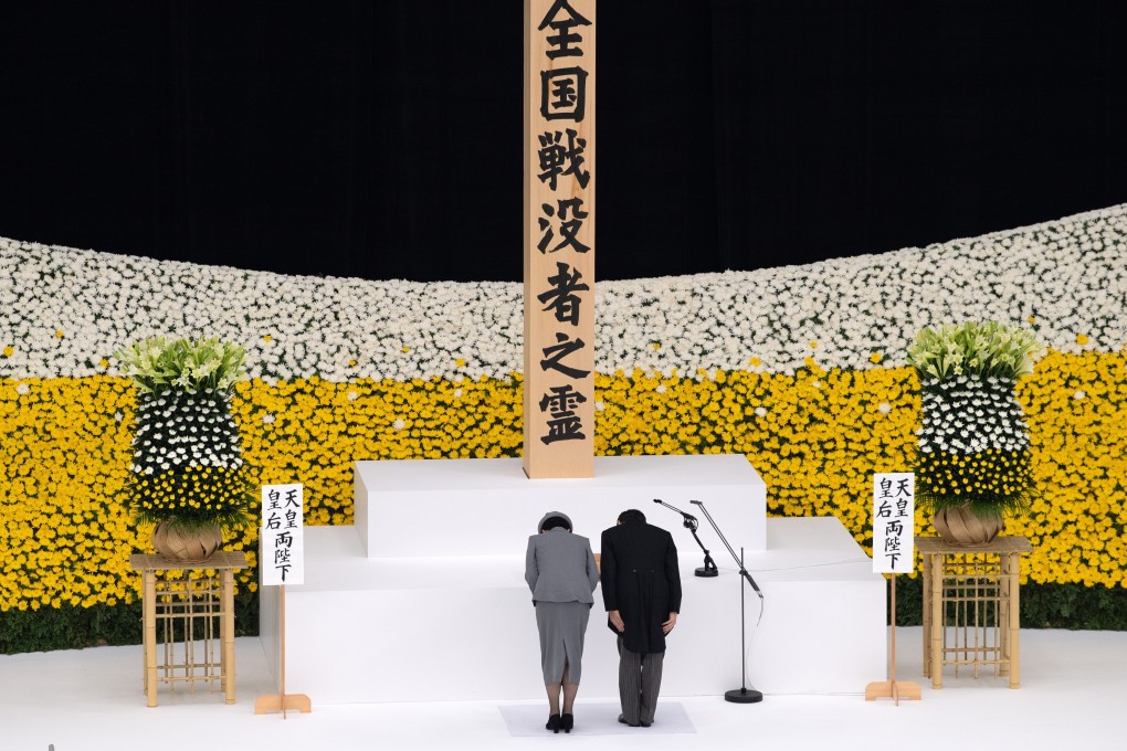 Emperor Naruhito and Empress Masako bow during a memorial service marking the 75th anniversary of Japan’s surrender in the second world war, in Tokyo, on August 15. Photo: Bloomberg