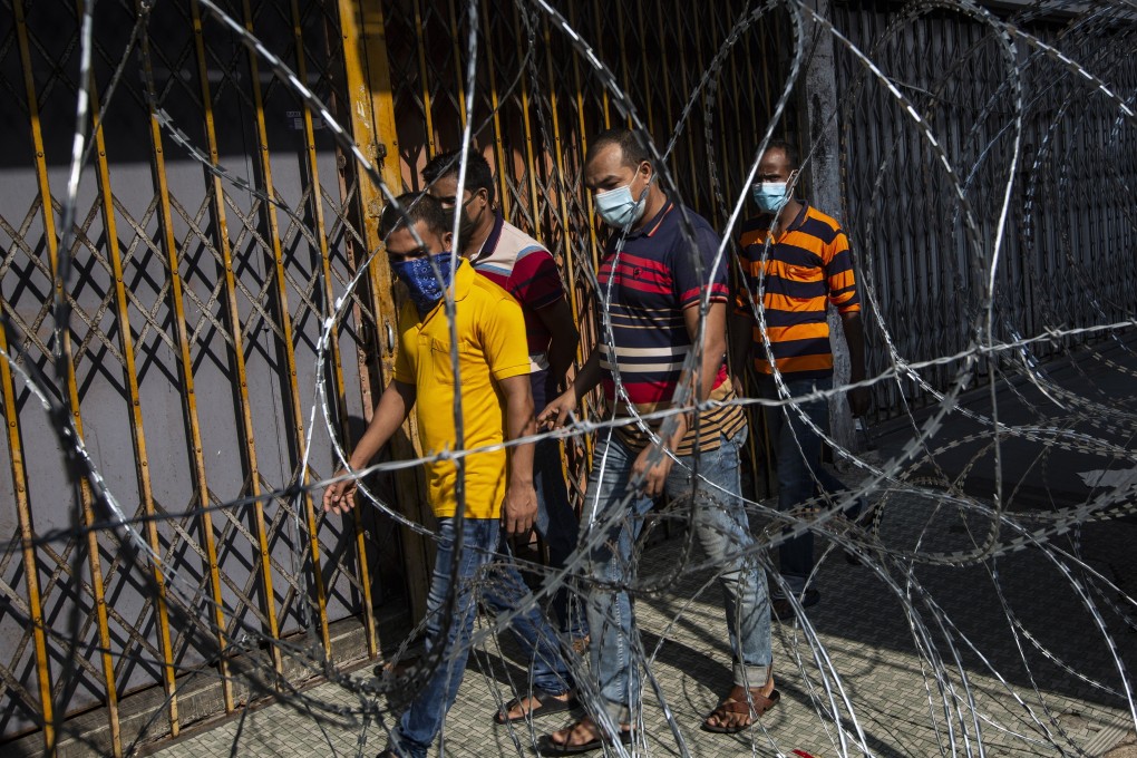 Migrant workers seen inside a locked down area in Kuala Lumpur on May 15, 2020. File photo: EPA-EFE