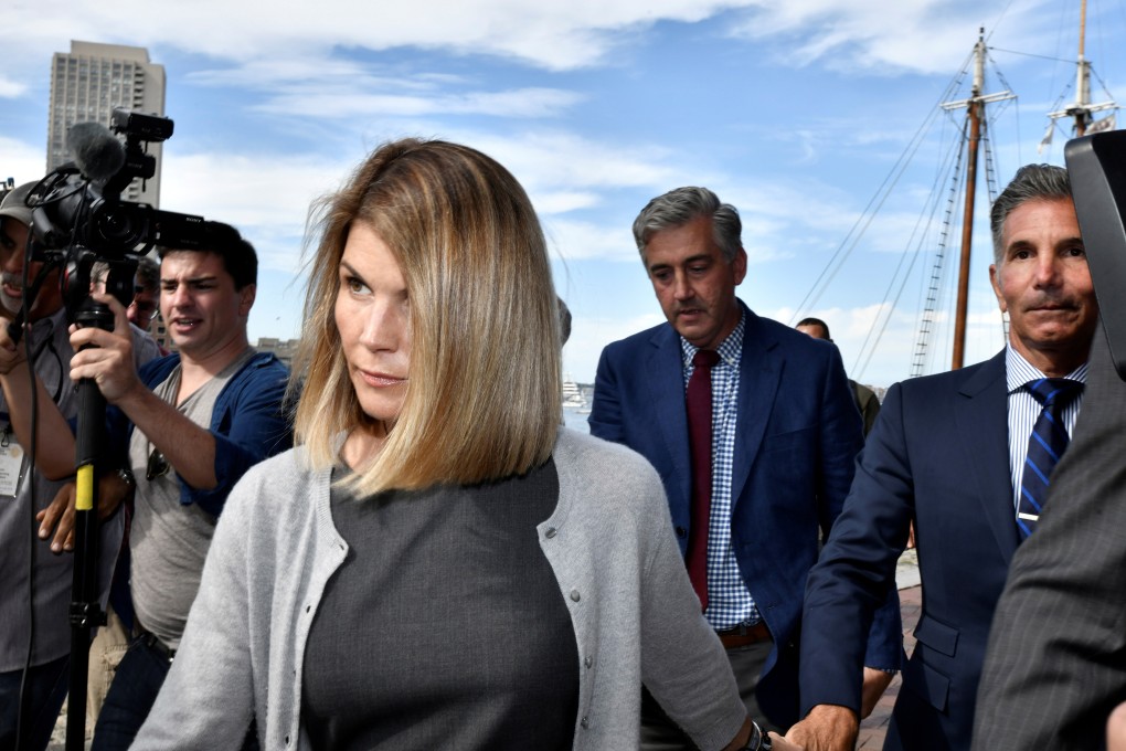 Actress Lori Loughlin, and her husband, fashion designer Mossimo Giannulli leave the federal courthouse. Photo: Reuters
