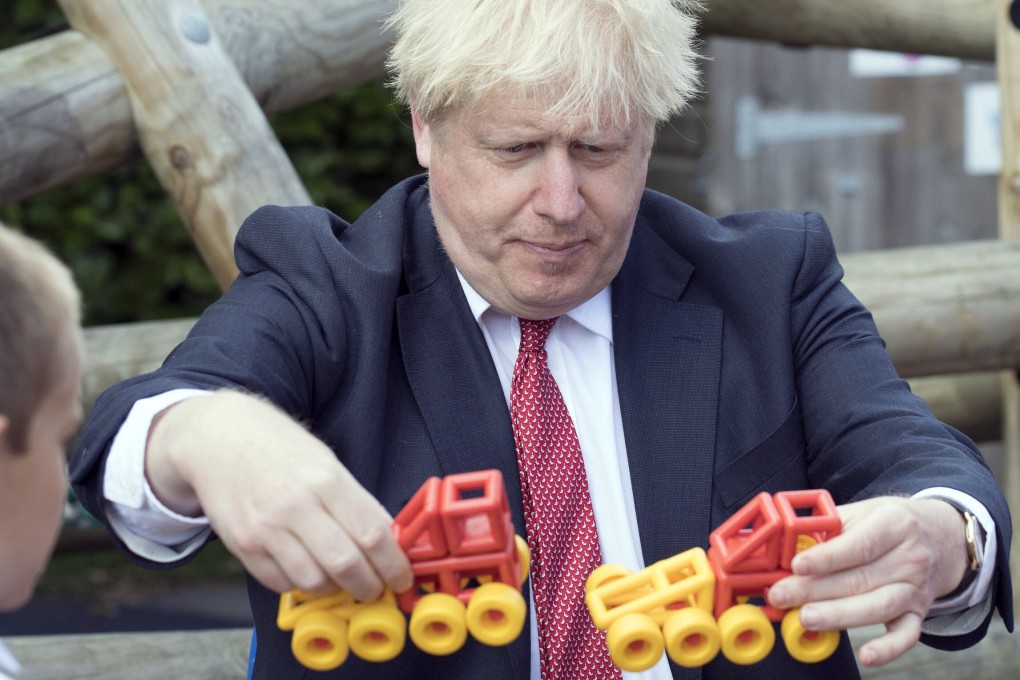 British Prime Minister Boris Johnson visits The Discovery School in West Malling, England in July. Photo: Evening Standard via AP