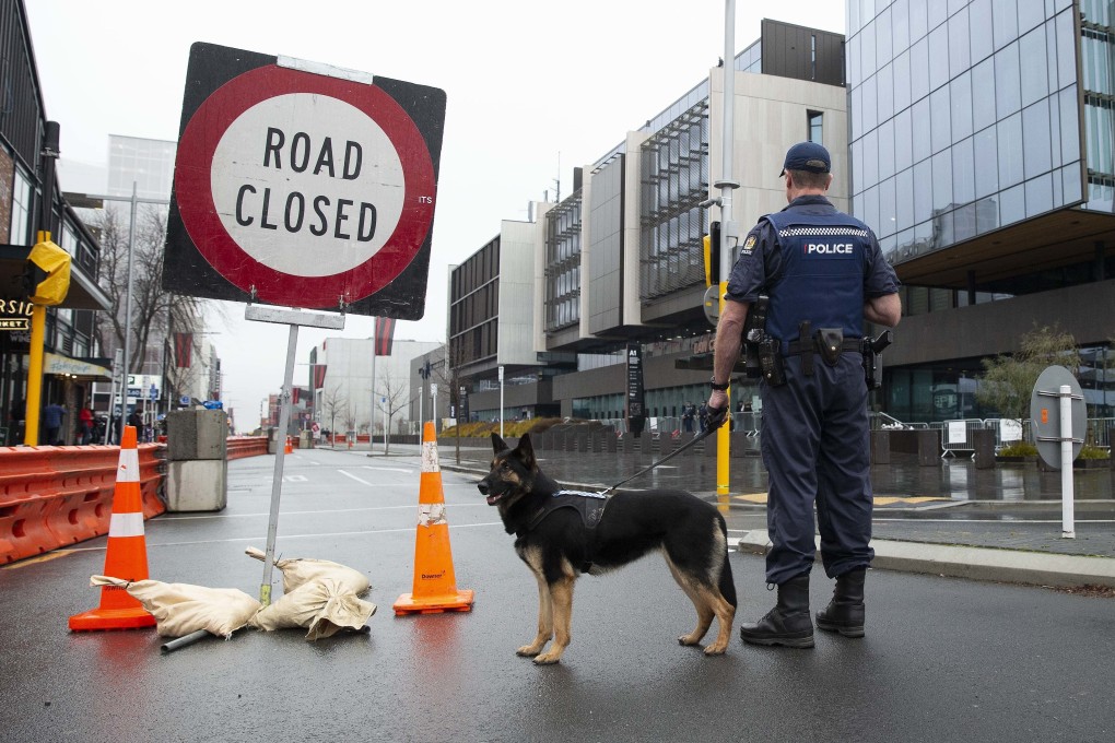 Police are seen outside the High Court in Christchurch, New Zealand. Photo: EPA