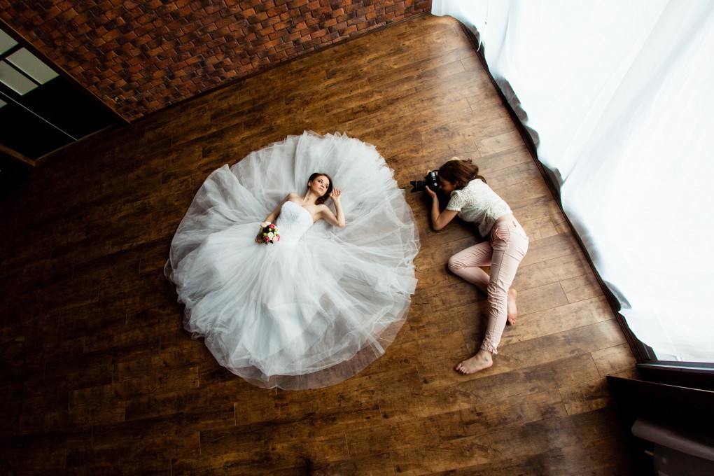 New wedding photo shoot services are just one of the innovative ideas wedding planners are coming up with for those whose wedding arrangements have been turned upside down. Photo: Shutterstock