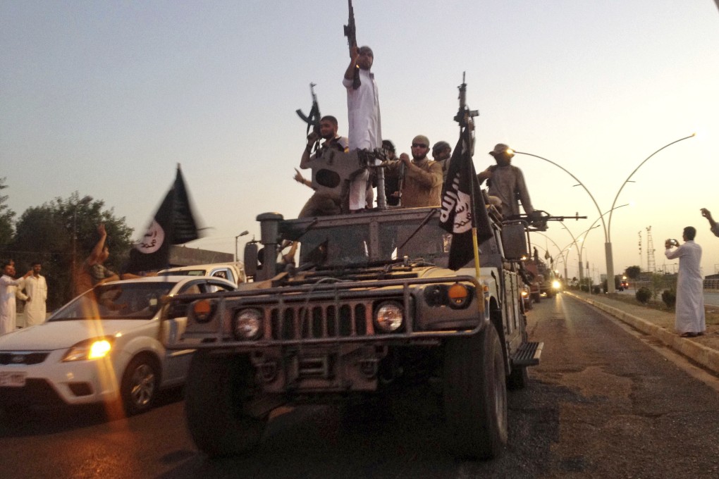 Islamic State fighters in the northern city of Mosul, Iraq in 2014. File photo: AP
