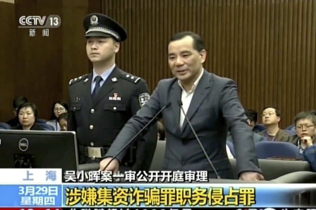 Wu Xiaohui, former chief of Anbang Insurance, seen in this image taken from undated video footage on China's CCTV, during his March 2018 trial at the Shanghai No. 1 Intermediate People's Court. He was later jailed for 18 years. Photo: CCTV via AP Video