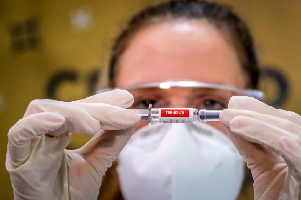 Traders remain focused on the hunt for treatments and vaccines for the coronavirus. Here, a nurse shows a Covid-19 vaccine produced by Chinese company Sinovac Biotech at the Sao Lucas Hospital in Porto Alegre, southern Brazil on August 8, 2020. The vaccine trial is being carried out in Brazil in partnership with Brazilian Research Institute Butanta. Photo: Agence France-Presse