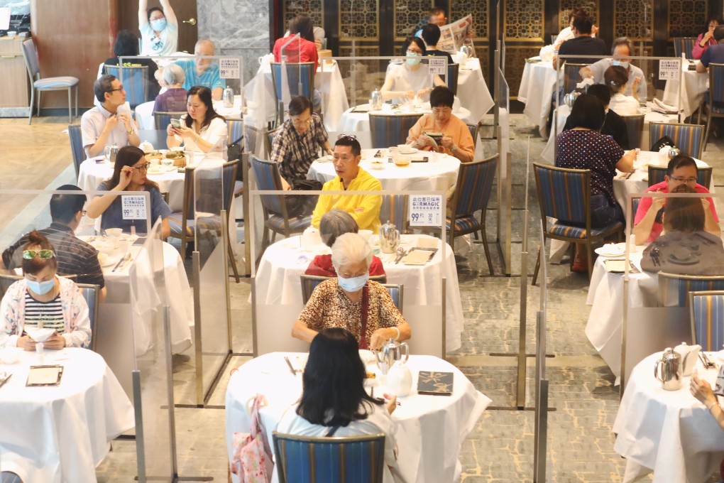 People having lunch at a restaurant in Mong Kok amid the third wave of coronavirus infections. Photo: Dickson Lee