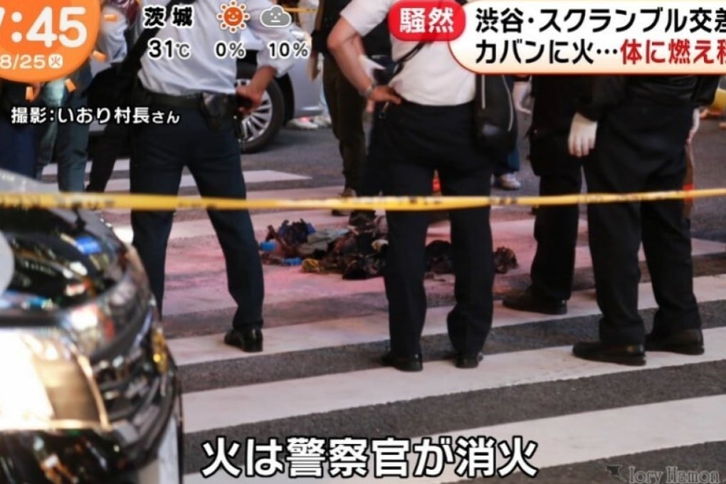 Authorities cordon off the burned remains of the man’s backpack. Photo: Twitter