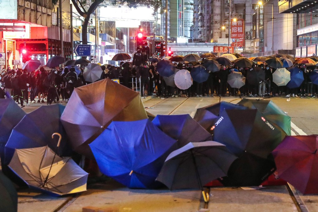 Sam Ka-lam claimed he was only watching the rally in Wan Chai on January 1. Photo: Sam Tsang