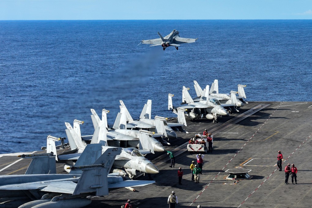 An F/A-18E Super Hornet takes off from the flight deck of a US navy aircraft carrier in the South China Sea. Photo: EPA