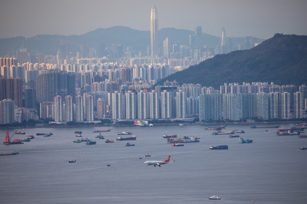 A plane prepares to land at Hong Kong International Airport on August 15. Covid-19 health check requirements are going to have a lasting impact on the way we travel. Photo: EPA-EFE