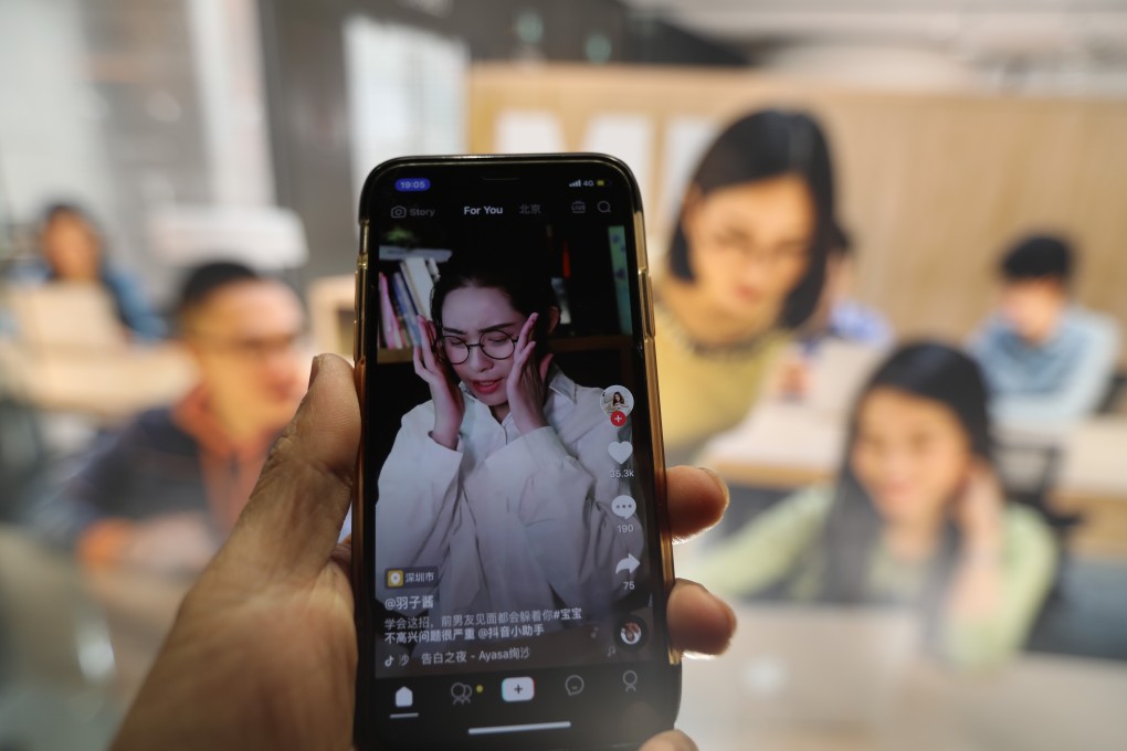 A smartphone shows live streaming on the Douyin short video platform. Photo: SCMP/Simon Song