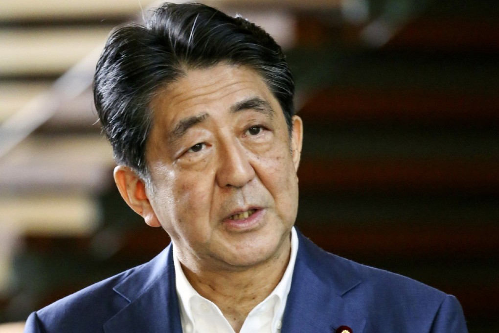 Japanese Prime Minister Shinzo Abe speaks to reporters at his official residence in Tokyo on Monday. Photo: Kyodo News via AP
