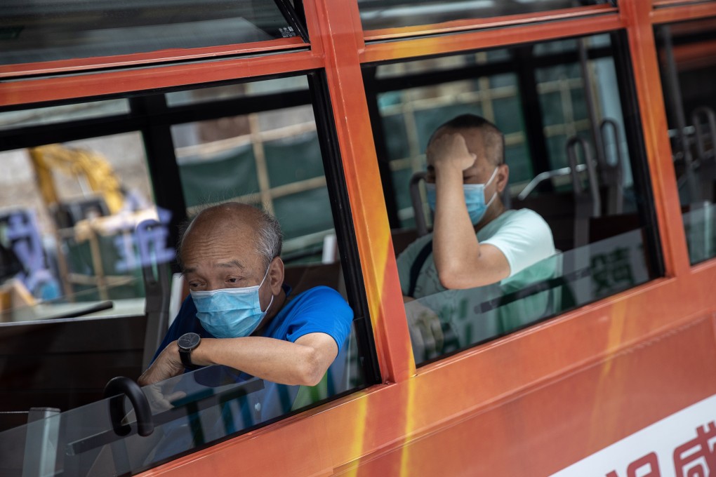 Passengers wear face masks on a tram in Hong Kong. Photo: EPA-EFE