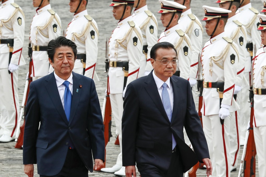 Japanese Prime Minister Shinzo Abe and Chinese Premier Li Keqiang in Tokyo in 2018. Photo: EPA-EFE