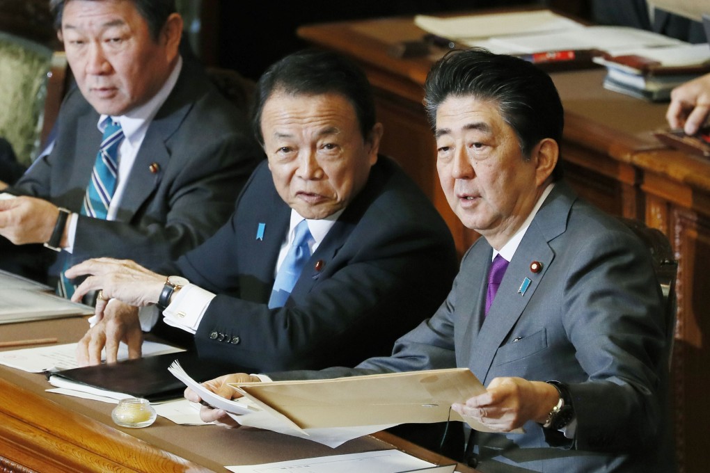 From left: Foreign minister Toshimitsu Motegi, Finance minister Taro Aso and Japan’s former PM Shinzo Abe. Photo: Kyodo