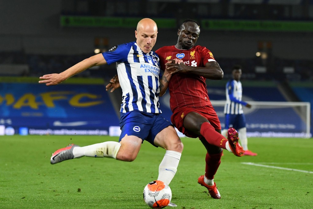Brighton & Hove Albion's Aaron Mooy in action with Liverpool's Sadio Mane in the 2019-20 English Premier League. Photo: Reuters