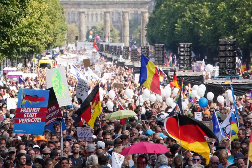 Around 38,000 protesters gathered for events across Berlin and police reported pockets of unrest, as infections rise in Europe and public frustration at measures to contain the virus grows. Photo: DPA