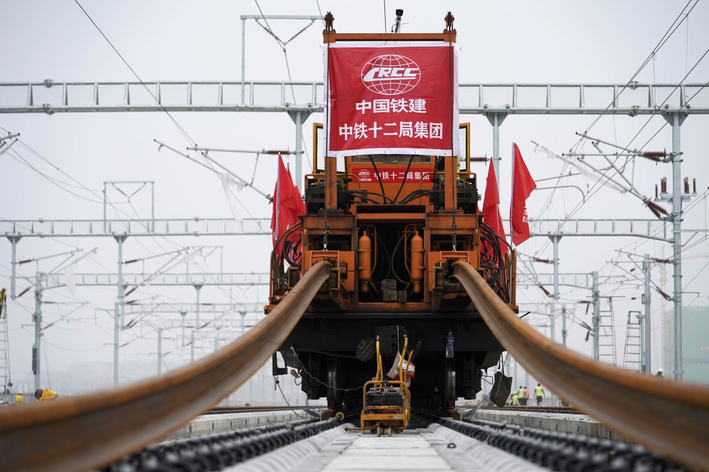 The final tracks are laid to complete the Beijing-Xiongan intercity railway, in Xiongan New Area, in northern China’s Hebei province, on August 17. Photo: Xinhua