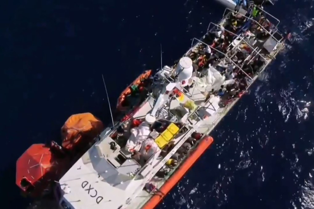 People on-board the Banksy-funded MV Louise Michel rescue vessel in the Mediterranean Sea. Photo: AFP