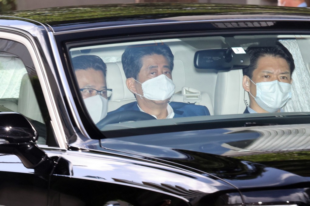 Japanese Prime Minister Shinzo Abe (centre) has announced his resignation due to illness after becoming Japan’s longest-serving leader in terms of consecutive days in office. Photo: Kyodo News via AP