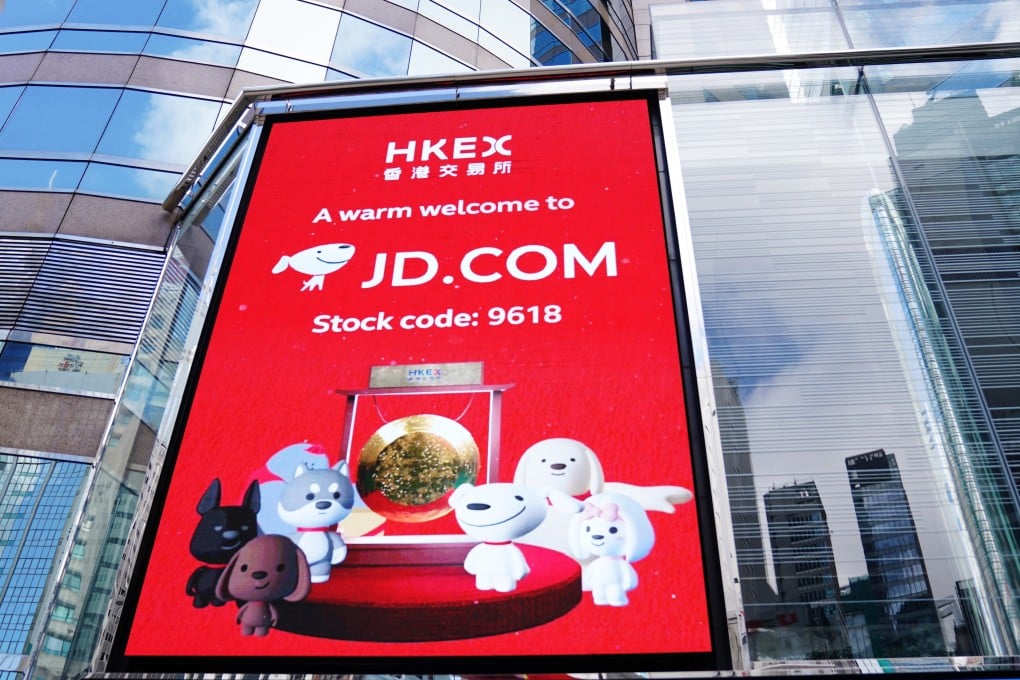 A screen showing the listing of JD.com in Hong Kong outside the trading hall of Hong Kong Exchanges and Clearing on June 18. Photo: Xinhua