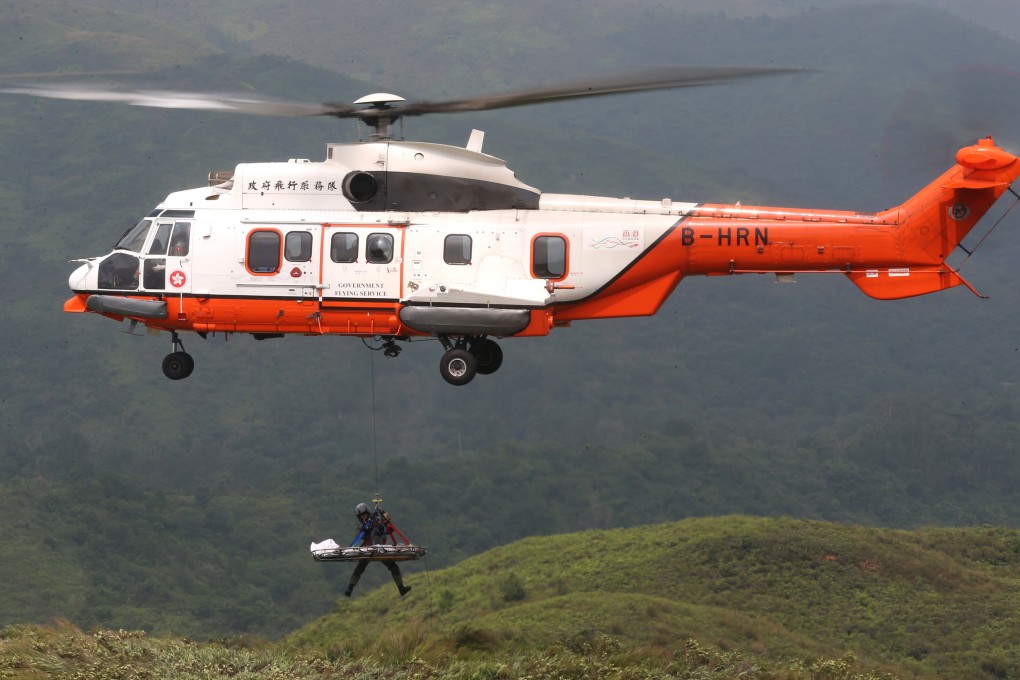 Hong Kong’s fire and flying services personnel, the Hospital Authority, and other government bodies hold an interdepartmental exercise simulating a vegetation fire and mountain rescue operation, in Lam Tsuen Country Park in the northern New Territories. Photo: K.Y. Cheng