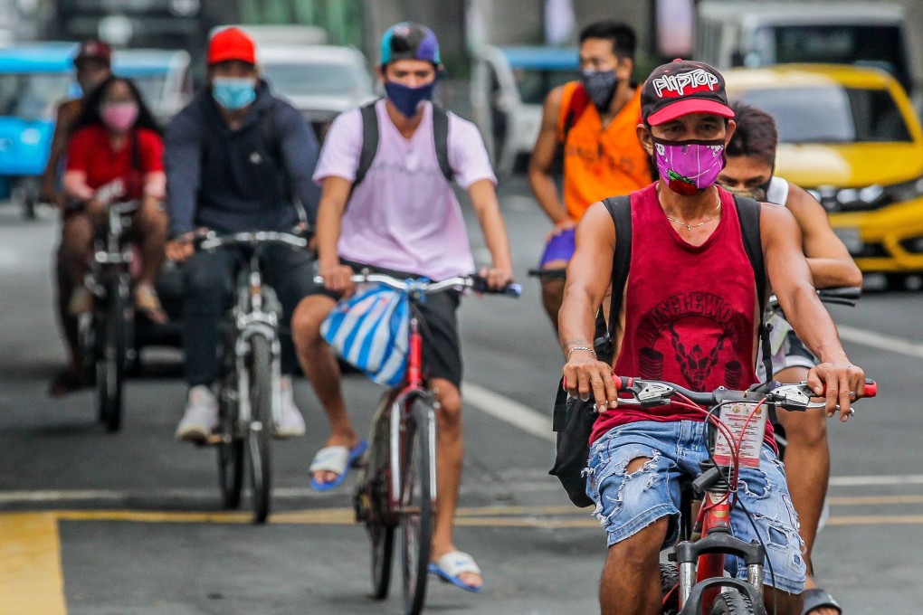 People seen wearing face masks in Manila, Philippines. Photo: Xinhua