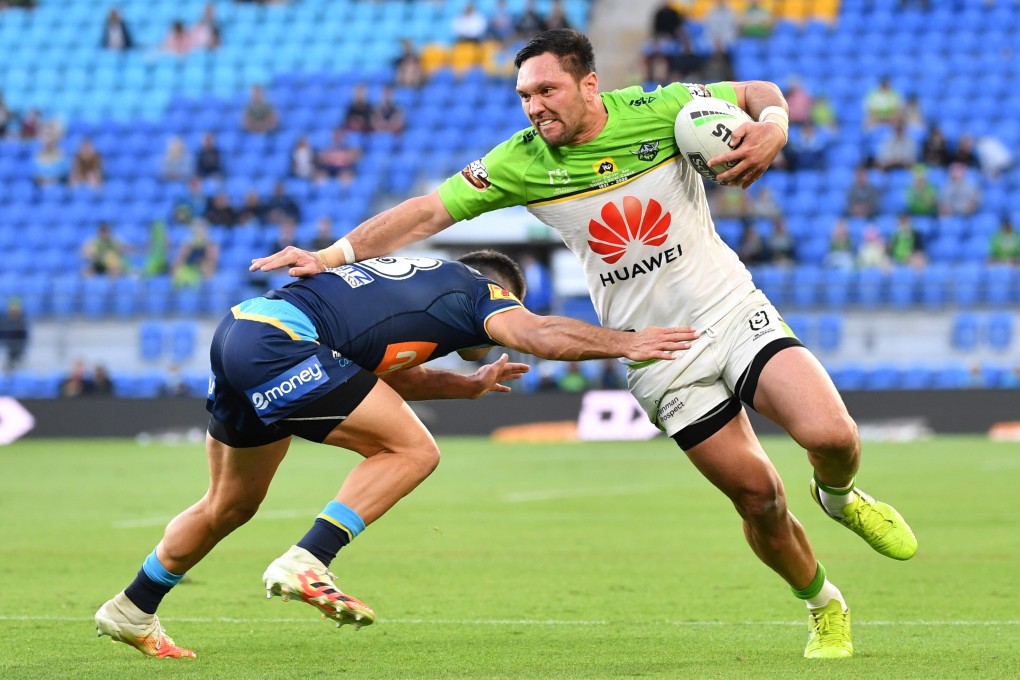 Jordan Rapana, right, of the Canberra Raiders in action, wearing the club’s jersey featuring main sponsor Huawei Technologies at the CBus Super Stadium in Robina, a suburb in the city of Gold Coast, in Queensland, Australia, on August 22. Photo: EPA-EFE