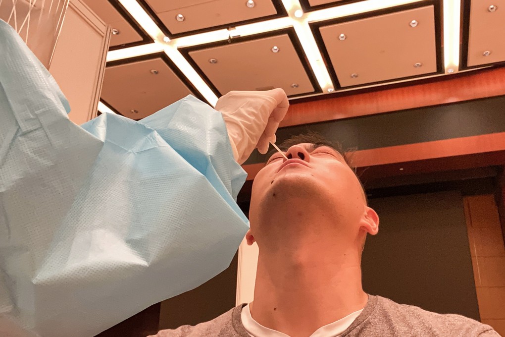 Post reporter Danny Lee getting a nasal swab. Photo: Danny Lee