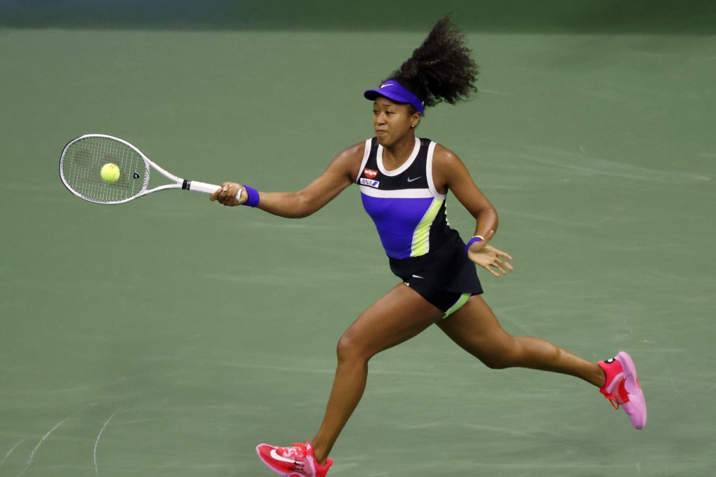 Naomi Osaka progressed to round two of the US Open with a three-set victory against compatriot Misaki Doi. Photo: EPA