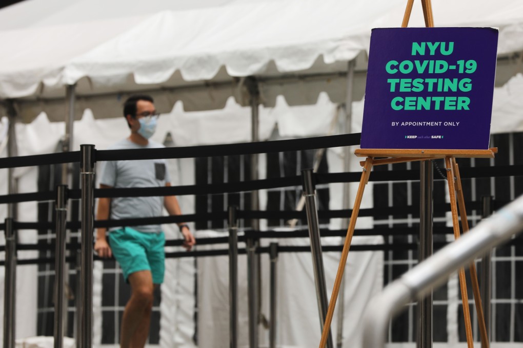 Students at New York University (NYU) take a Covid-19 test outside its business school. Photo: AFP