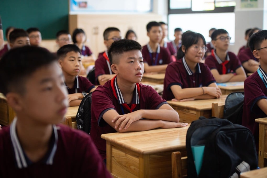 Students were back in the classroom at the Daowu Middle School in Liuyang, Changsha, on Monday. Schools in the Hunan capital were among the first to reopen. Photo: Xinhua
