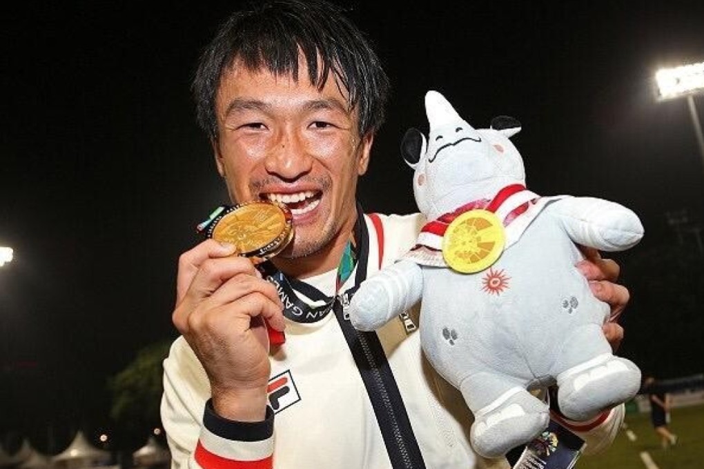 Salom Yiu celebrating with his gold medal after beating Japan. Photo: @sportsroad