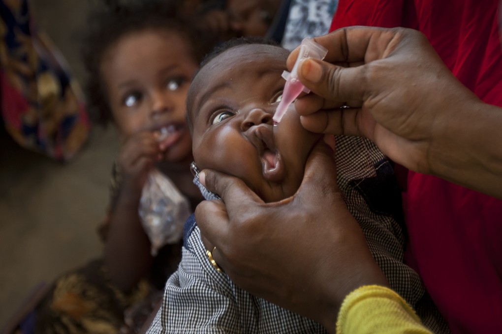 A Somali child receives a polio vaccine in this 2013 file photo. Photo: AP
