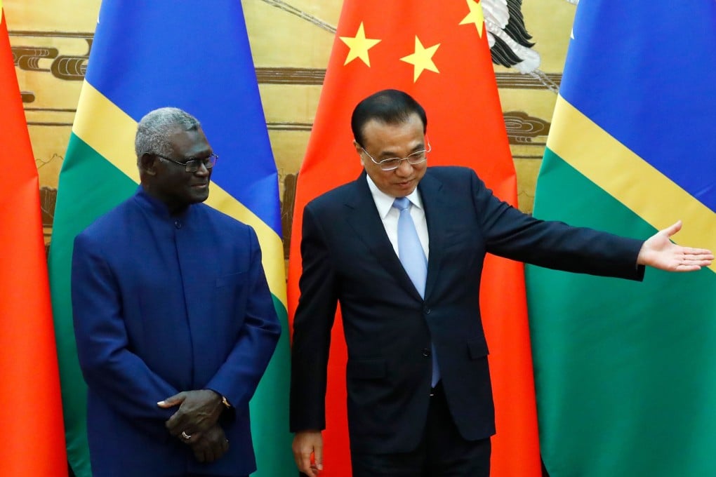 Solomon Islands Prime Minister Manasseh Sogavare with Chinese Premier Li Keqiang in Beijing in 2019. Photo: AFP