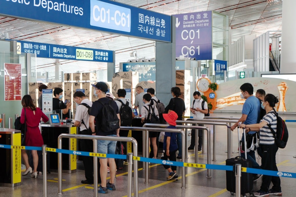 Travellers make their way to the domestic departures area at Beijing Capital International Airport, on Tuesday, August 25. Domestic travel demand is on the rise in China. Photo: Bloomberg