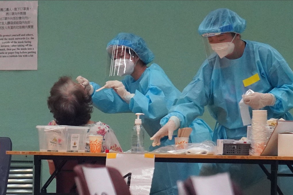 A Hong Kong resident participates in the government’s mass Covid-19 testing scheme at a facility in To Kwa Wan on Wednesday. Photo: Winson Wong