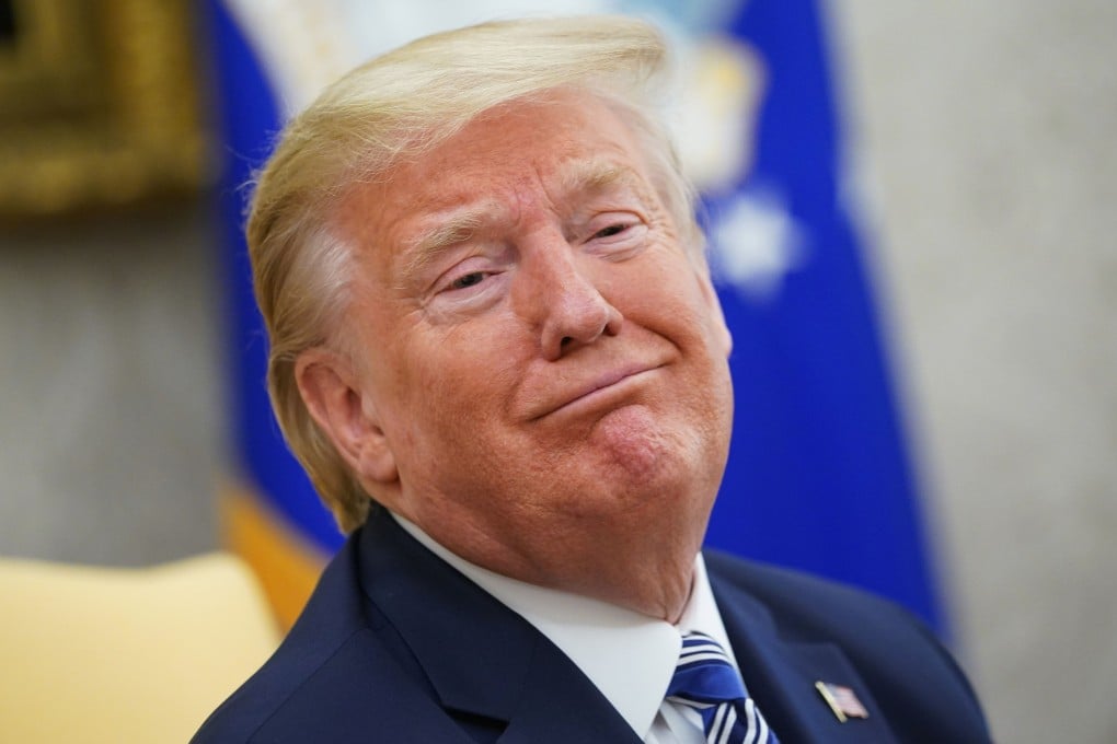 US President Donald Trump urged his supporters to vote early by mail and then follow up by attempting to vote in person, in a series of tweets on Thursday. Photo: AFP