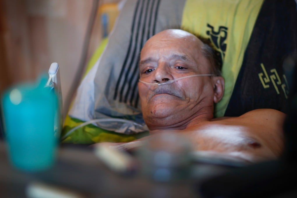 Alain Cocq in the medical bed he has been confined to for years as a result of a degenerative disease that has no treatment. Photo: Reuters