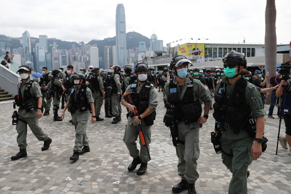 Police on patrol earlier this year in Tsim Sha Tsui, where protesters plan to rally on Sunday. Photo: Sam Tsang