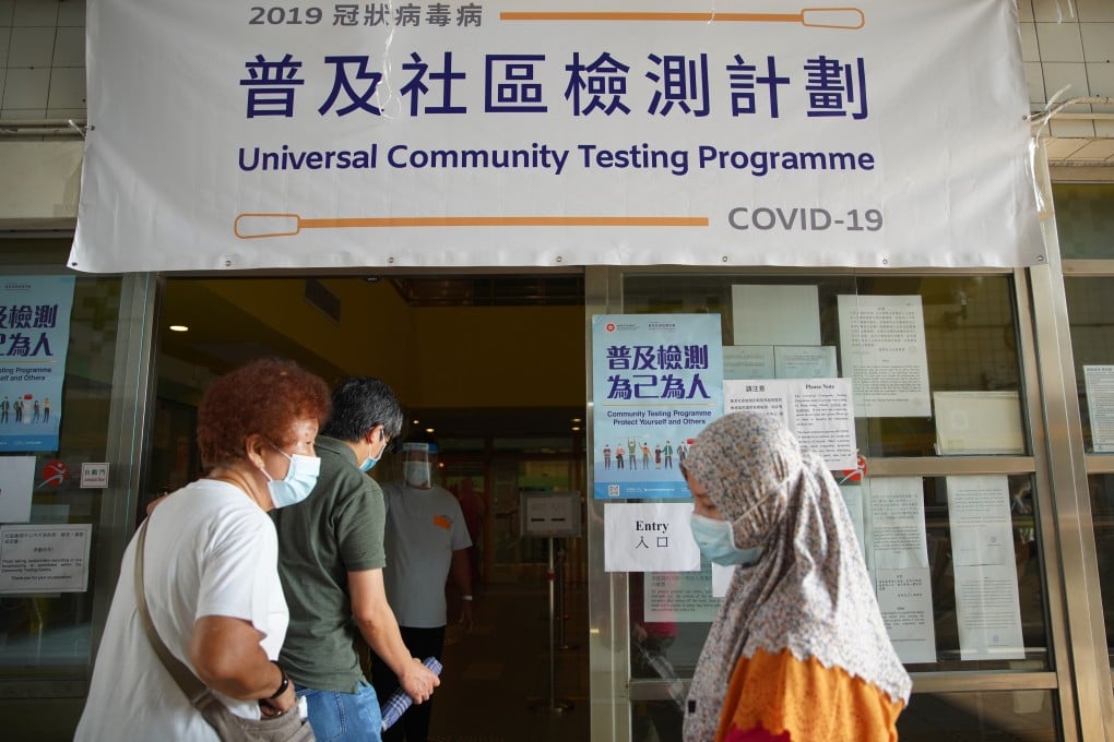 Hong Kong residents enter a coronavirus testing centre in Kowloon City. Photo: Winson Wong