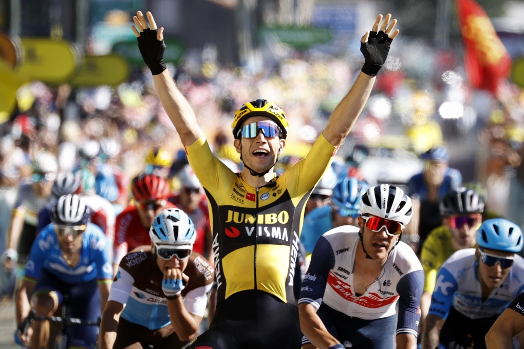 Belgian cyclist Wout Van Aert of Team Jumbo-Visma celebrates as he crosses the finish line to win the seventh stage of the Tour de France. Photo: DPA