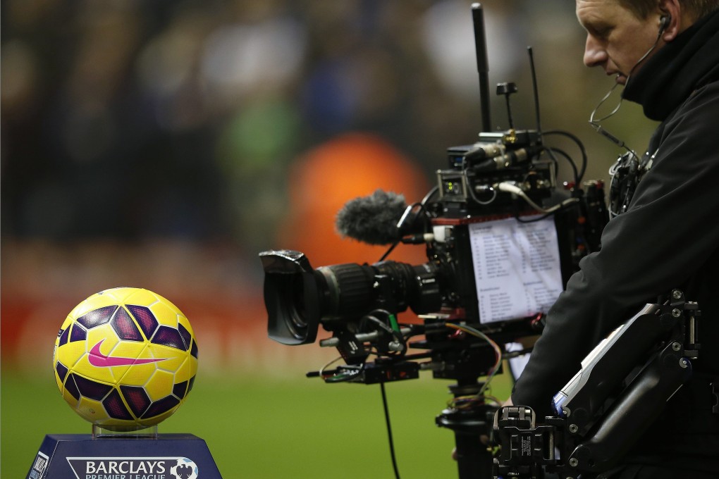 A television camera films the match ball before an English Premier League game between Liverpool and Tottenham Hotspur. Photo: Reuters