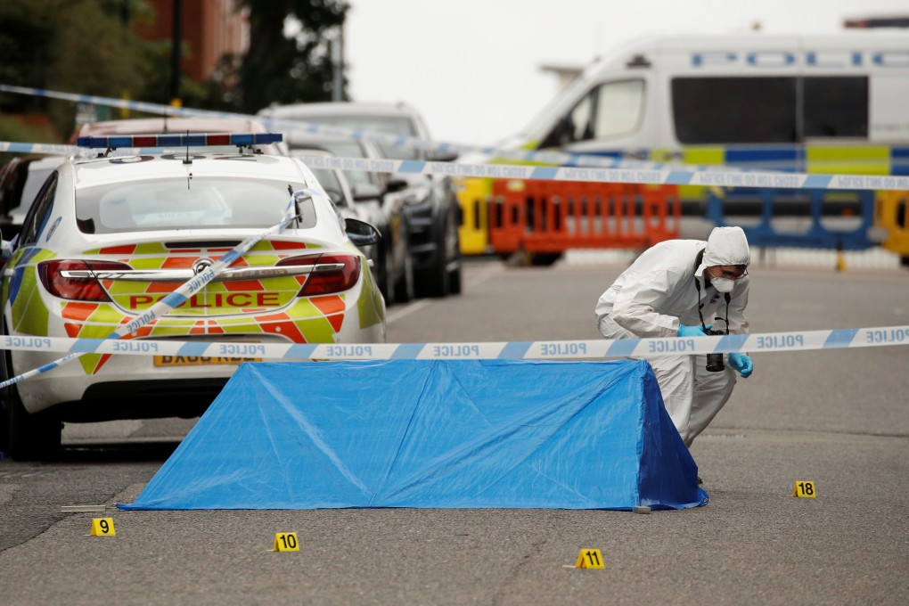 A forensic worker investigates at the scene of the stabbings in Birmingham. Photo: Reuters