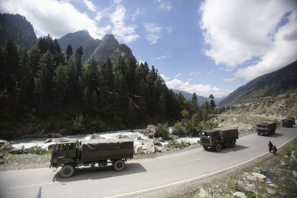 An Indian army convoy moves on the Srinagar-Ladakh motorway on September 1. Photo: AP