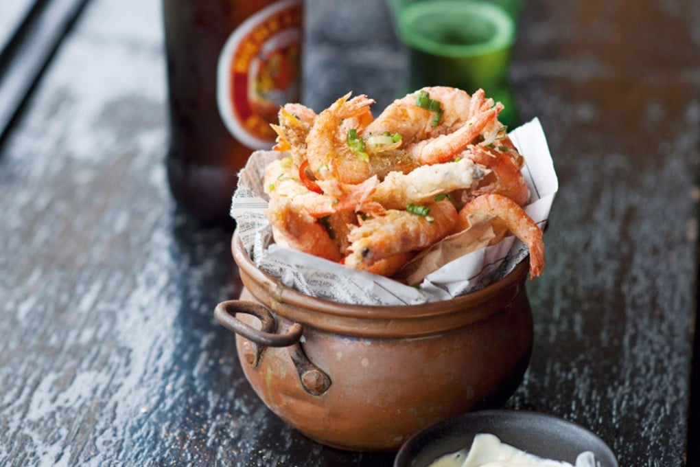 Chilli salted school prawns with garlic prawns from Luke Nguyen’s cookbook, Indochine. Photo: Handout