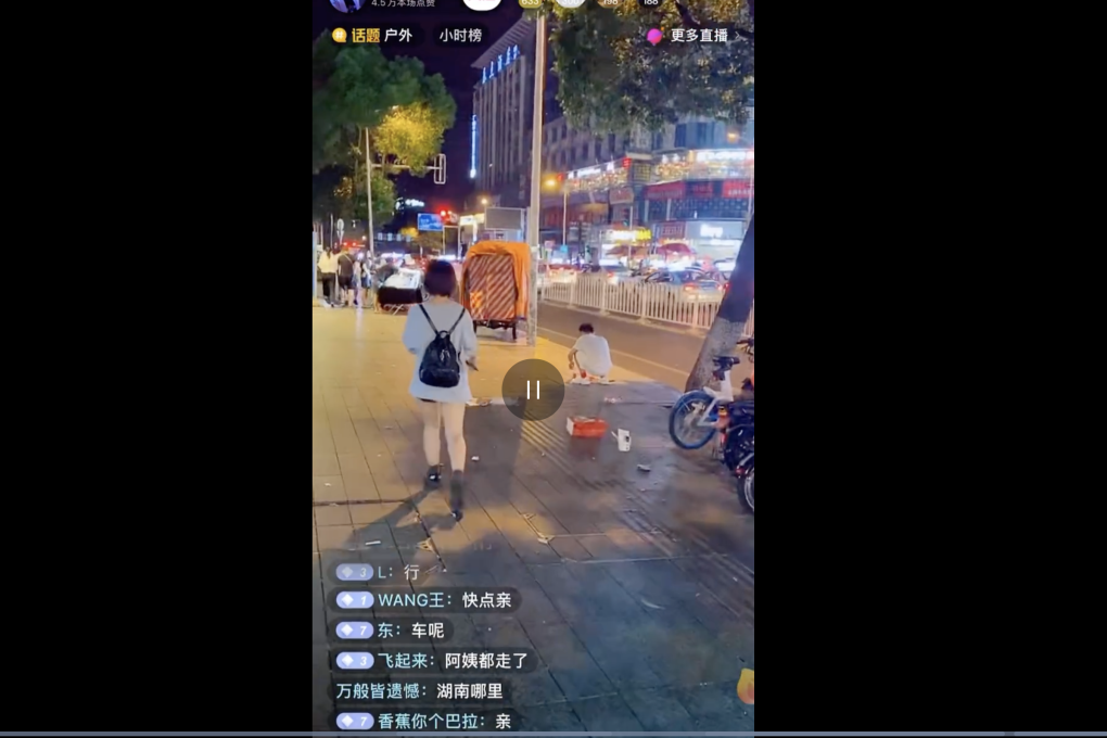 A live-streamer films himself following young women on the street before being banned from the Douyin platform. Picture: Douyin via Weibo