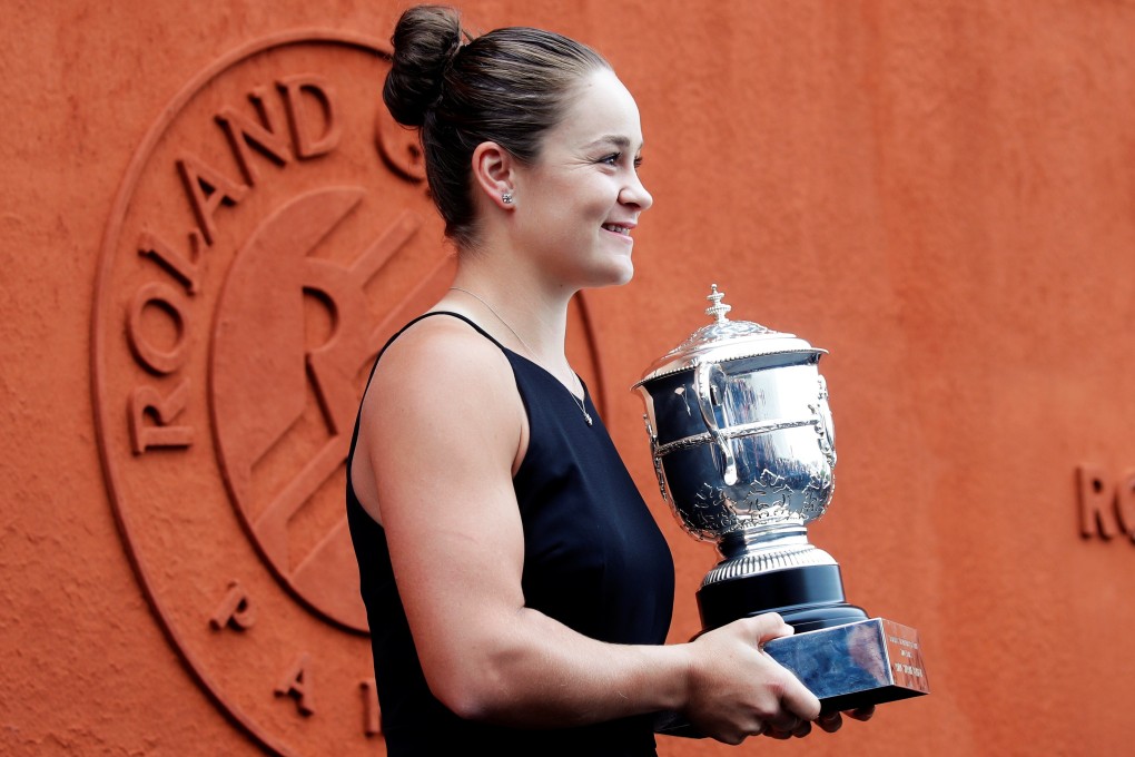 Australia’s Ashleigh Barty with the French Open trophy at Roland Garros. Photo: Reuters