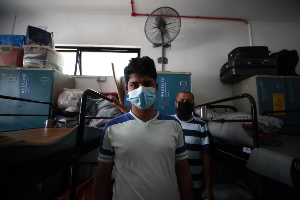 Migrant workers pictured in their dormitory room in Singapore on August 18. Photo: EPA