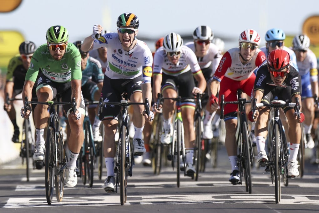 Ireland’s Sam Bennett crosses the finish line ahead of Slovakia’s Peter Sagan to take stage 10 of the Tour de France. Photo: AP